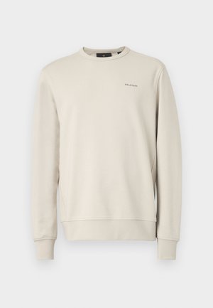 Lysebeige sweatshirt lavet af blød bomuldsblanding, med runde halsudskæring, lange ærmer og et diskret logo på brystet.