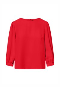 Blusa rossa in tessuto liscio, con collo rotondo, maniche lunghe a sbuffo e una zip nascosta sul retro. Design pulito e a taglio dritto.