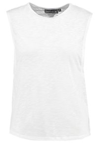 White sleeveless top made of lightweight, textured fabric. Features a round neckline and a slightly curved hemline for a relaxed fit.
