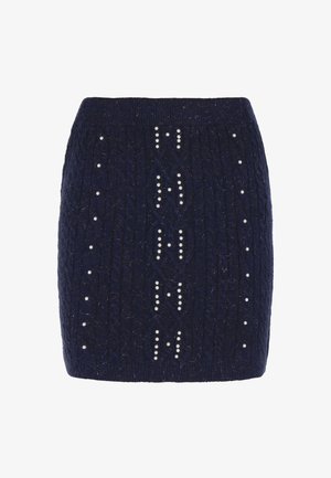 Tume sinise lõngaga kootud mini-seelik tõmblukkmustriga, kaunistatud valgete kunstpärlitega nii vertikaalsetes kui horisontaalsetes ridades, elastne vöökoht.