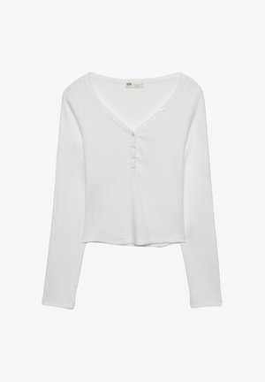 Weißes Langarmshirt mit V-Ausschnitt, das über Knopfdetails und eine gerippte Textur verfügt, entworfen für eine lässige Passform.