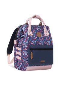 Floral-patterned backpack in navy and pink with leather accents, top handles, zippers, and padded straps for comfort.