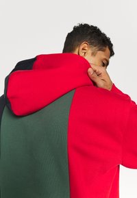 Karl Kani SIGNATURE BLOCK HOODIE - Kapuzenpullover - grey/navy/white