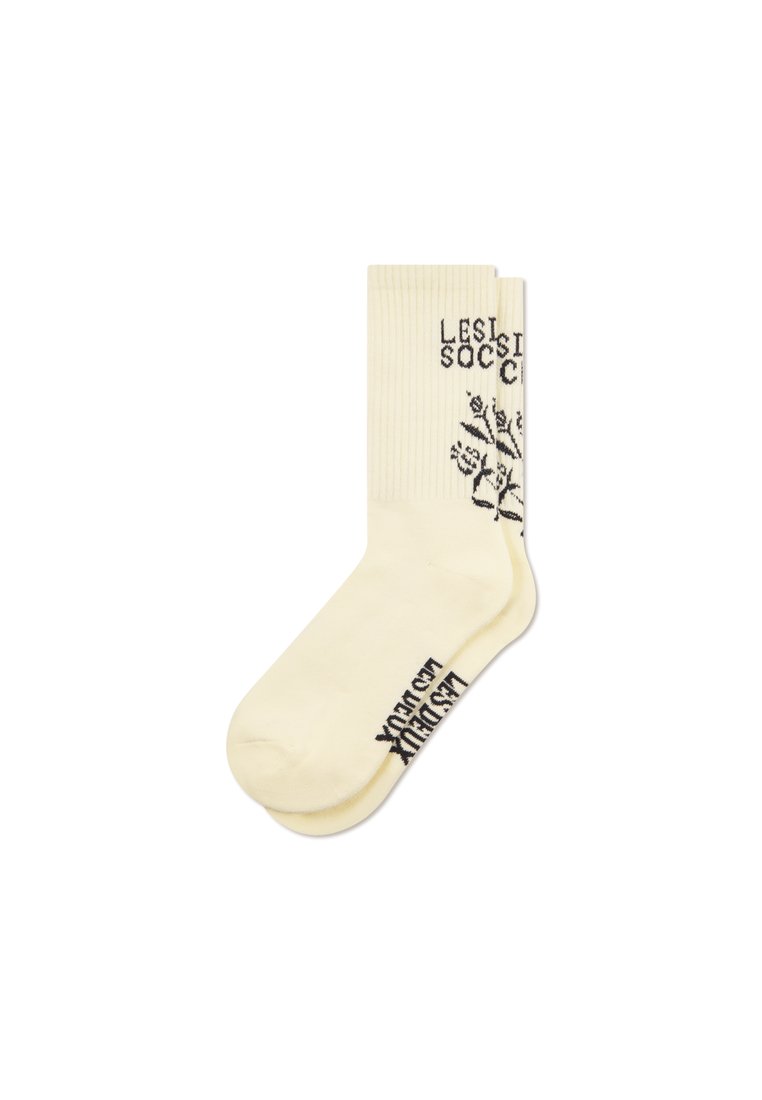Cream-colored cotton blend knee-high socks with ribbed top. Features black text and floral design on the side. Smooth texture.