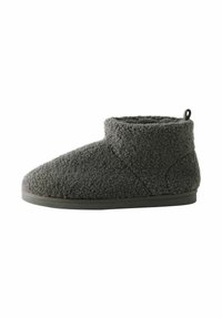 Tummanharmaa fleece-ankkalippis, jossa on kumipohja ja pieni vetotab sisäpuolella.