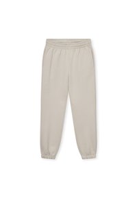 Beige színű pamut jogger nadrág elasztikus derékkal, oldalzsebekkel és szűkített mandzsettákkal a bokán. Sima textura és laza szabás.