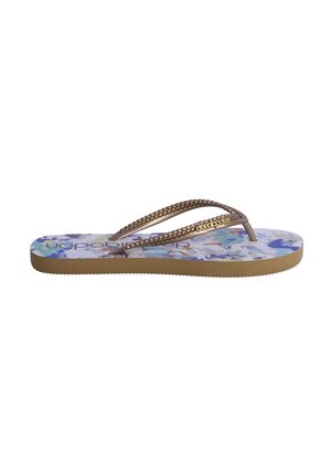 Chancla marrón con tiras trenzadas, plantillas con estampado floral en colores pastel y suela de goma texturizada.