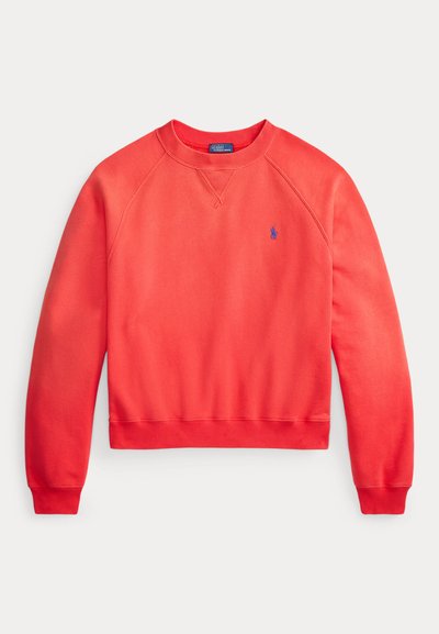 Red crewneck sweatshirt with long sleeves and a small blue embroidered logo on the left chest, laid flat on a white background.