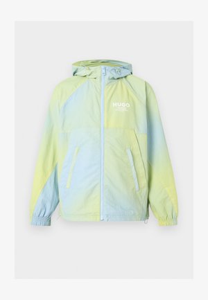Kevyt hupullinen takki, jossa vaaleankeltaiset ja siniset liukuvärit, edessä vetoketju, joustavat hihansuut, kaksi sivutaskua ja rintataskussa "HUGO"-logo.