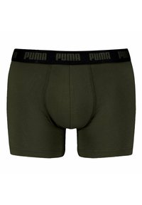 Boxer da uomo verde oliva con una vita elastica nera che presenta il marchio "PUMA" in rilievo. Progettati con una forma aderente e una texture morbida.