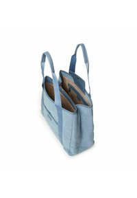 Sac fourre-tout bleu clair en tissu texturé, avec deux compartiments, une poche zippée intérieure et des poignées doubles pour le transport.