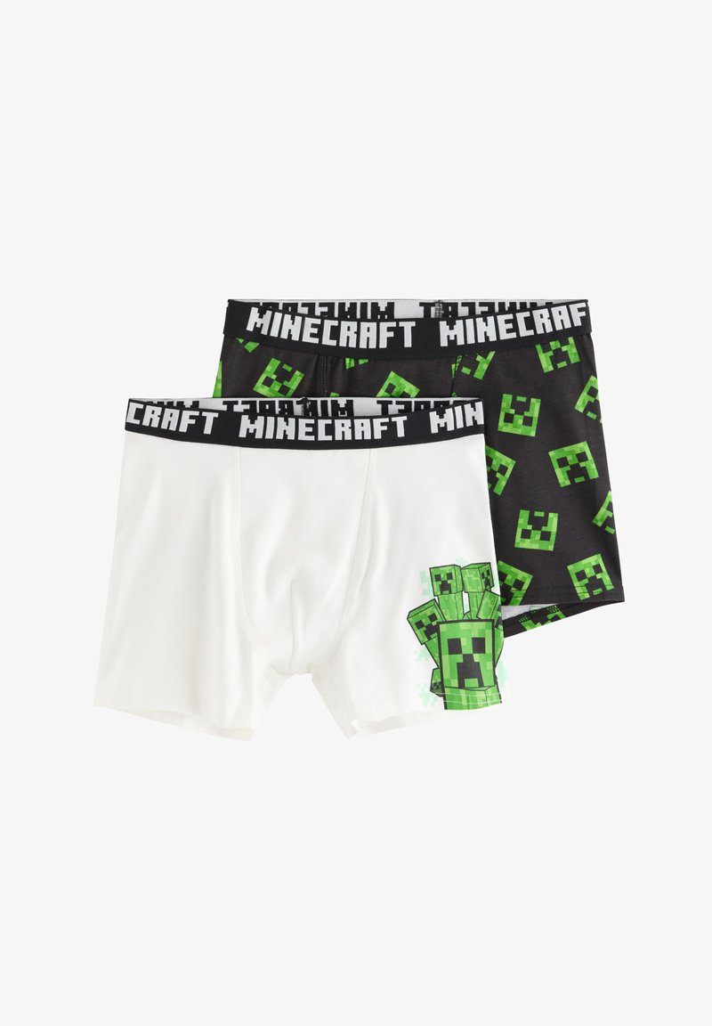 Δύο ζευγάρια μπόξερ με θέμα το Minecraft, ένα λευκό με ένα πράσινο ψηφιοποιημένο πλάσμα ως γραφικό και ένα μαύρο με επαναλαμβανόμενο μοτίβο από πράσινο ψηφιοποιημένο πρόσωπο.