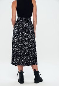 Herita PRINTED LONG SLIT - Gonna a campana - black