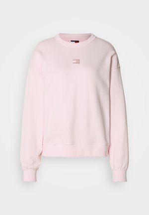 Hellrosa Sweatshirt aus Baumwollmischung, mit einem Rundhalsausschnitt, langen Ärmeln, gerippten Bündchen und einem kleinen Logodetail auf der Brust.