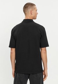 Calvin Klein Jeans TEXTURE - Polo - ck black