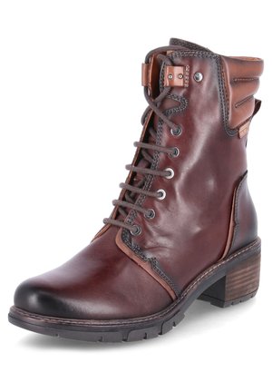 Brown leather ankle boot with a rounded toe, lace-up front, and cushioned collar. Features a block heel and textured rubber sole.