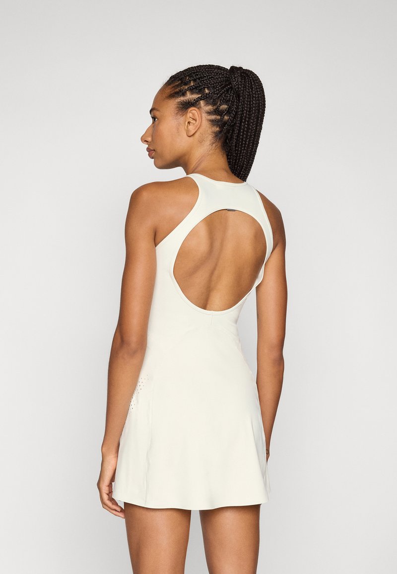 sachin and babi light blue dress adidas by Stella McCartney ASMC TPR DR - Sports dress - almond  milk/off-white