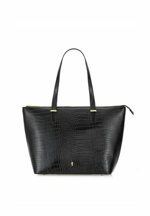 Czarna torba typu tote z tłoczonym wzorem krokodyla, ze złotymi elementami, dwiema ramiączkami na ramię i zamknięciem na zamek błyskawiczny. Gładka faktura, usztywniony kształt i płaska podstawa.