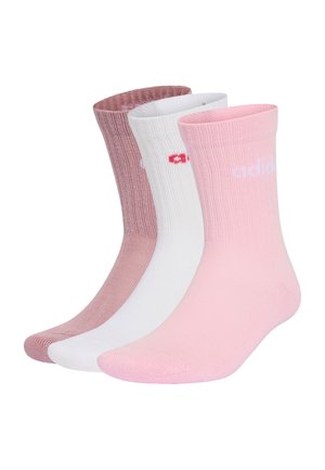Tres calcetines de longitud media doblados en colores rosa, blanco y malva con textura acanalada y texto de logo tenue cerca de la parte superior.