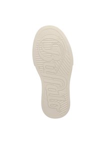 Kremfarget sneaker såle med teksturert grep mønster. Har preget merkevare navn i midten og horisontale linjer for trekkraft.