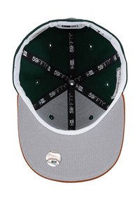 Green fabric cap with a grey brim and brown accent. Interior features black branding labels and a baseball logo sticker on the brim.