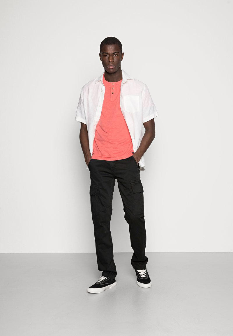 Alpha Industries Reisitaskuhousut - Black/Musta - Zalando.fi