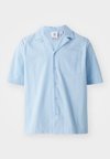 Shirt - clear sky
