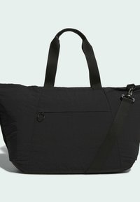 Borsa tote nera in tessuto strutturato, con doppi manici, tracolla staccabile e tasca frontale con cerniera.