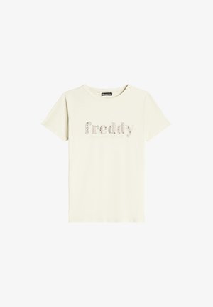 T-shirt crema a maniche corte con testo "freddy" in strass, scollo rotondo e taglio dritto. Tessuto morbido senza motivi visibili.