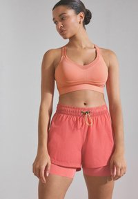 Next HIGH IMPACT - Sujetador deportivo - coral pink