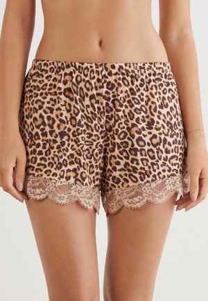 Leopardenprint shorts van lichtgewicht stof met een elastische tailleband en gegolfde kantafwerking aan de zoom. De kleurenpalette bevat bruin- en tinten.