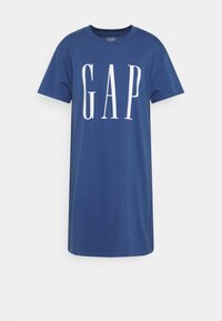Robe T-shirt en coton bleu avec manches courtes et col ras du cou. Présente un logo blanc "GAP" bien visible centré à l'avant. Coupe simple et décontractée.