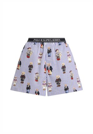Falda corta de algodón con rayas verticales azules y blancas. Decorada con motivos de osos de dibujos animados con varios atuendos. Cintura elástica negra.