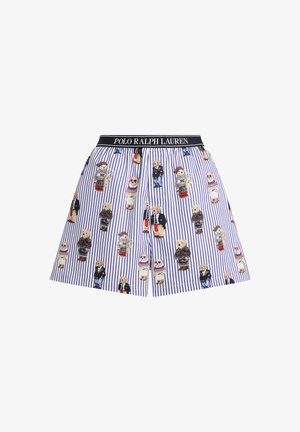 Falda corta de algodón con rayas verticales azules y blancas. Decorada con motivos de osos de dibujos animados con varios atuendos. Cintura elástica negra.