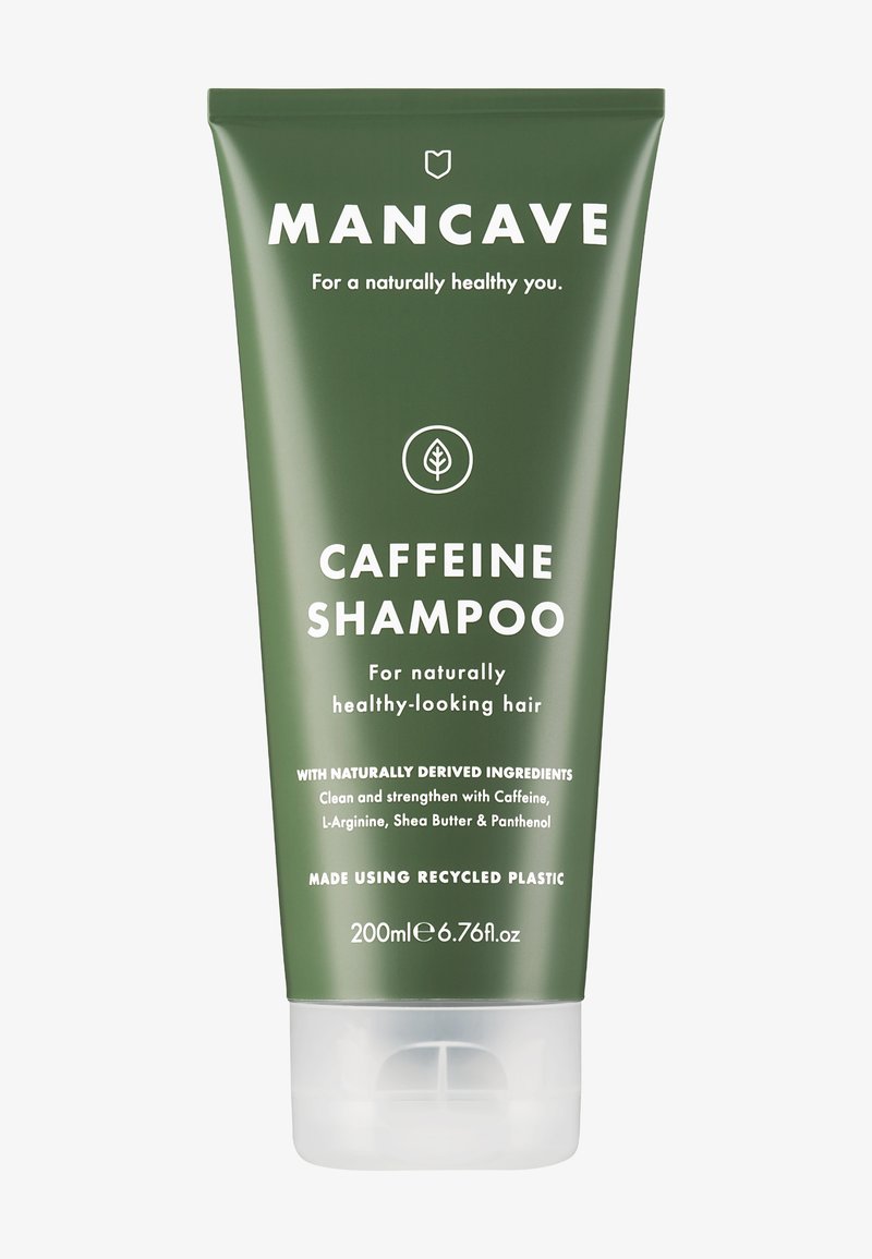 Groene knijpfles van cafeïne shampoo, met witte tekst en een bladicoon. Inhoud: 200 ml. Gemaakt van gerecycled plastic.