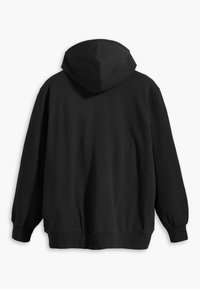 Zwarte hoodie met een zachte textuur, oversized pasvorm en geribbelde manchetten en onderrand. Beschikt over een naadloze capuchon voor een minimalistische uitstraling.