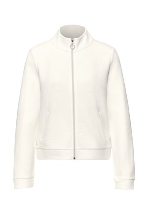 Veste blanche à texture, à fermeture éclair, avec col montant, manches longues, poches avant et tirette de fermeture éclair circulaire.