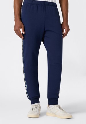 - Spodnie treningowe