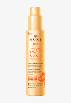 NUXE sun spray in a gold cylindrical bottle with a nozzle. Text highlights SPF 50, UVA/UVB protection, and water-resistant properties.
