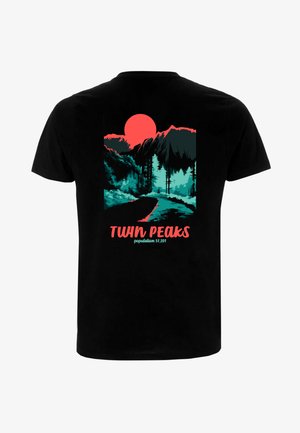 Black t-shirt featuring a colorful graphic of mountains, a red sun, and text reading "TWIN PEAKS" and "population 51,201."