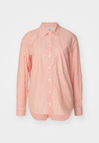 Long-sleeve button-up shirt with coral and white vertical stripes, pointed collar, chest pocket, and rounded hem.