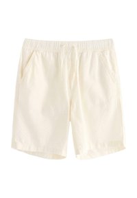 Ljusbeiga shorts i mjukt material, med elastisk midja, dragsko och två sidofickor. Enkelt, rent design.