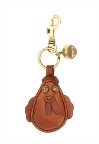 Portachiavi in pelle a forma di gallina, di colore marrone, con moschettone in ottone e targhetta decorativa in metallo. Presenta dettagli cuciti e occhi a bottone.