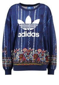 Felpa blu navy con motivi floreali ricamati sul fondo, con un grande logo Adidas bianco sulla parte anteriore e polsini a costine.