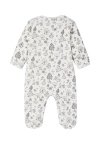 Langärmliger Jumpsuit aus weißem Stoff mit grauen, naturinspirierten Illustrationen, darunter Bäume und Tiere. Weicher, gemütlicher Stoff.
