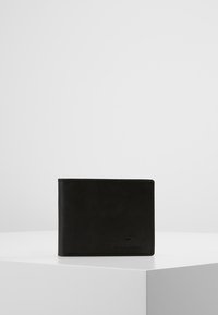 Black leather wallet with a smooth texture and stitched edges. Features a logo on the front and a compact, bi-fold design.
