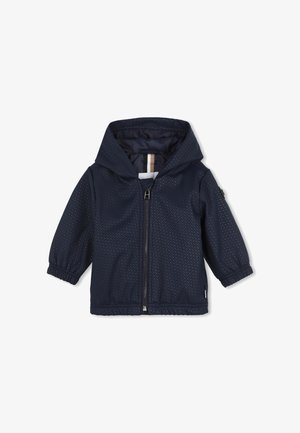 Marineblauwe windbreaker met een gestructureerd oppervlak, elastische boorden en een capuchon. Voorzien van een ritssluiting aan de voorkant en details met zijzakken.