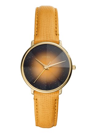 Okrągły złoty zegarek Fossil z tarczą o gradientowym przejściu od czarnego do bursztynowego, złotymi wskazówkami godzin, minut i sekund oraz teksturowanym żółtym paskiem skórzanym.