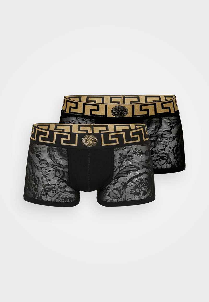 Boxer-briefs noirs avec des panneaux en dentelle florale transparente et une ceinture élastique en or contrastant arborant un motif de clé grecque et un logo.