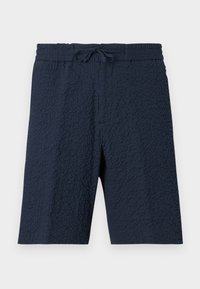 Βερμούδα από υφή ύφασμα σε ναυτικό μπλε με ελαστική μέση και δέσιμο μπροστά, μέχρι το γόνατο, casual στυλ.